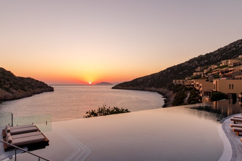 HotelGriechenlandDaios CoveDC Main Pool Sunrise 01