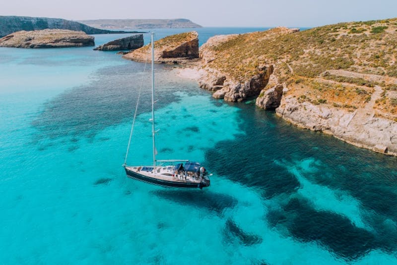 MaltaAerial of Yacht in Blue Lagoon off Comino