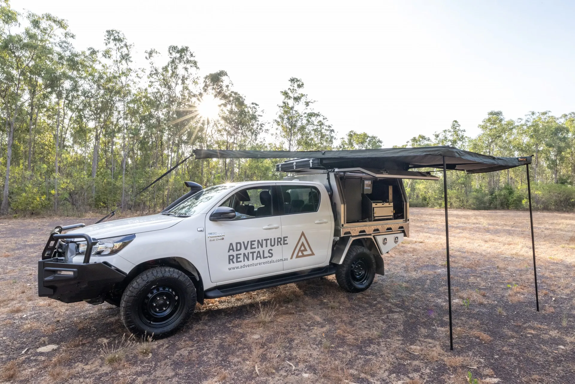 FahrzeugeAdventure RentalsToyota Hilux 4WD Camper 1RTTAwning Photocredit Adve