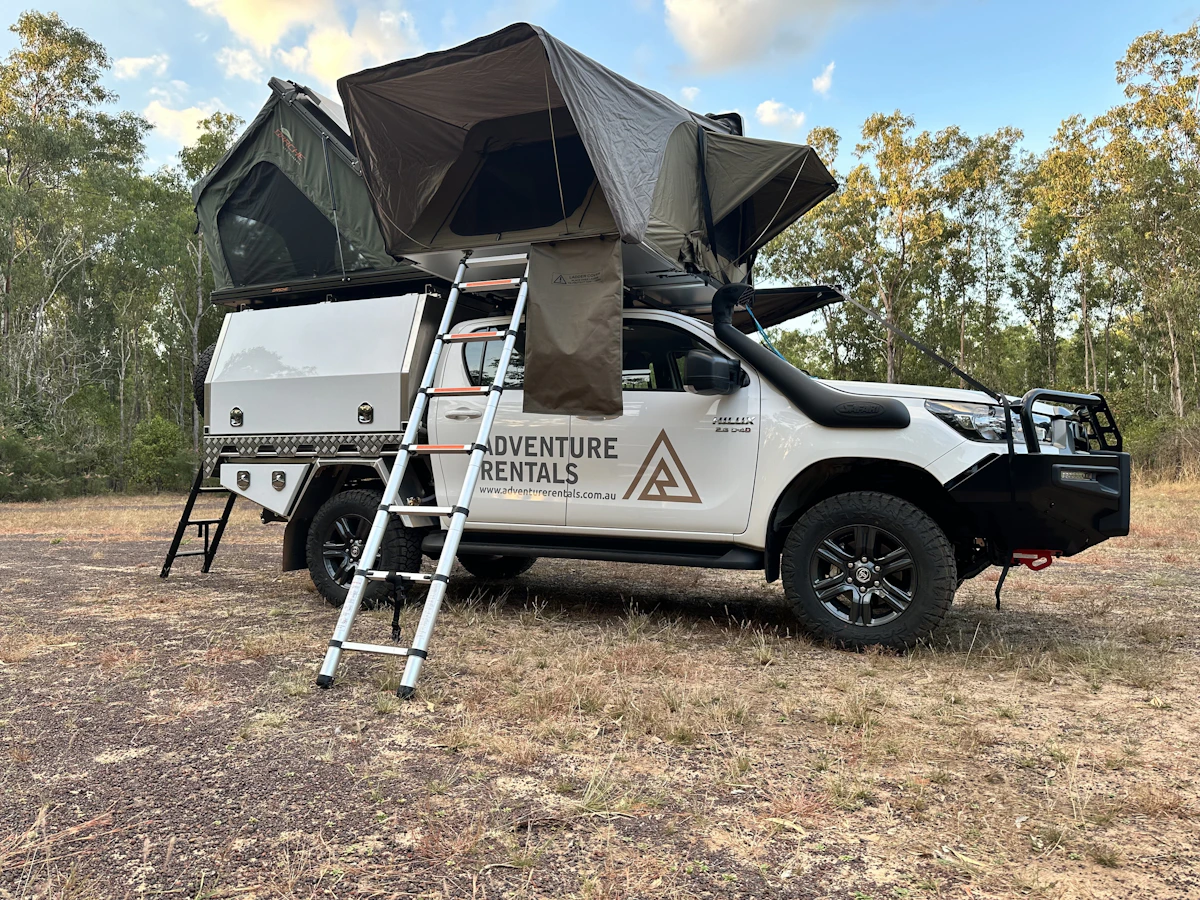 FahrzeugeAdventure RentalsToyota Hilux 4WD Camper 2RTTDriver Side View Photoc