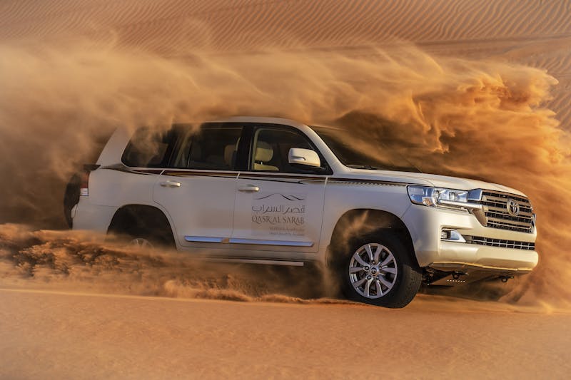 HDHotelAbu DhabiQasr Al SarabActivities Dune Bashing Car side