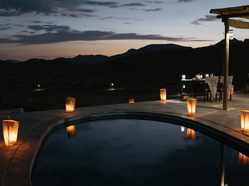 HDHotelNamibiaWilderness Damaraland CampPool by night