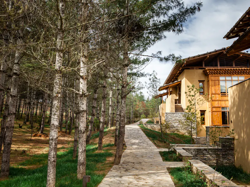 HDHotelBhutanSix Senses ParoParo Bhutan Suites exterior walkway