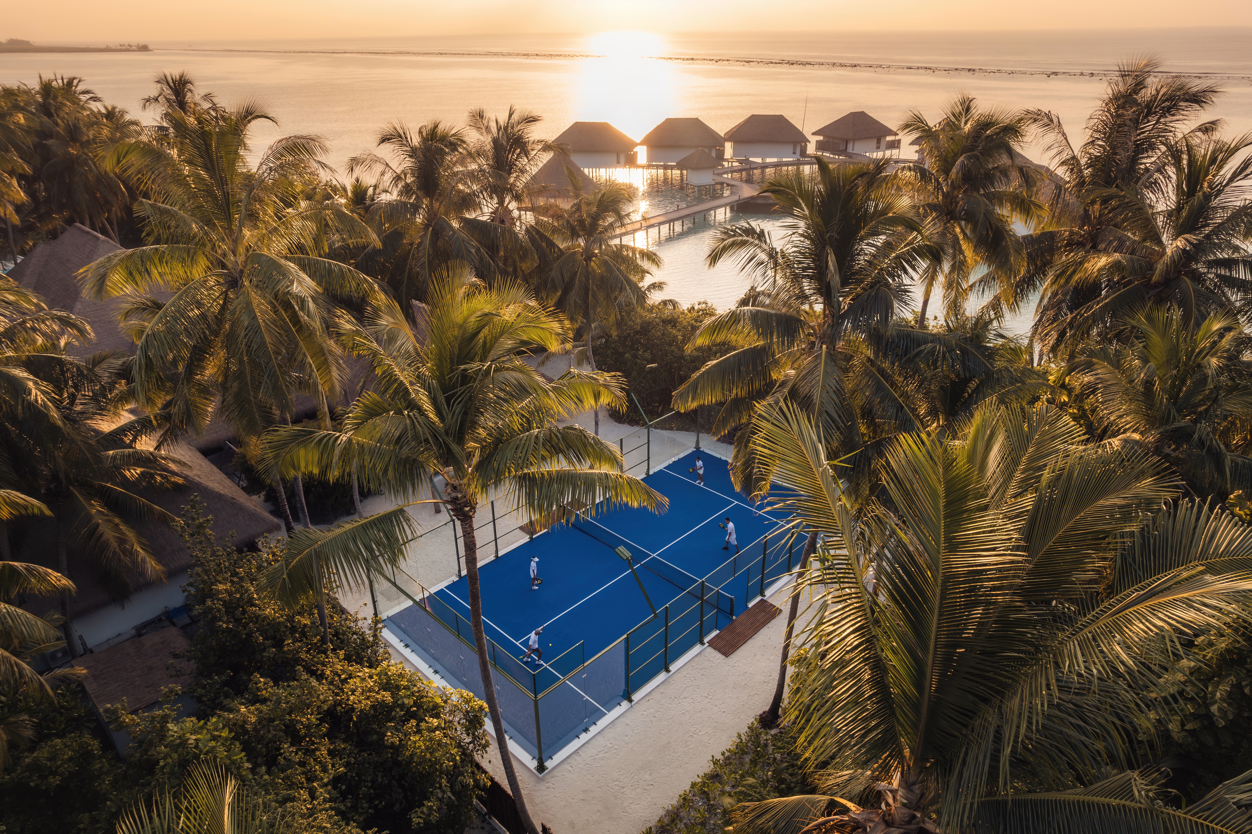 HDHotelMaledivenCOMO MaalifushiPadel Court at Sunrise.